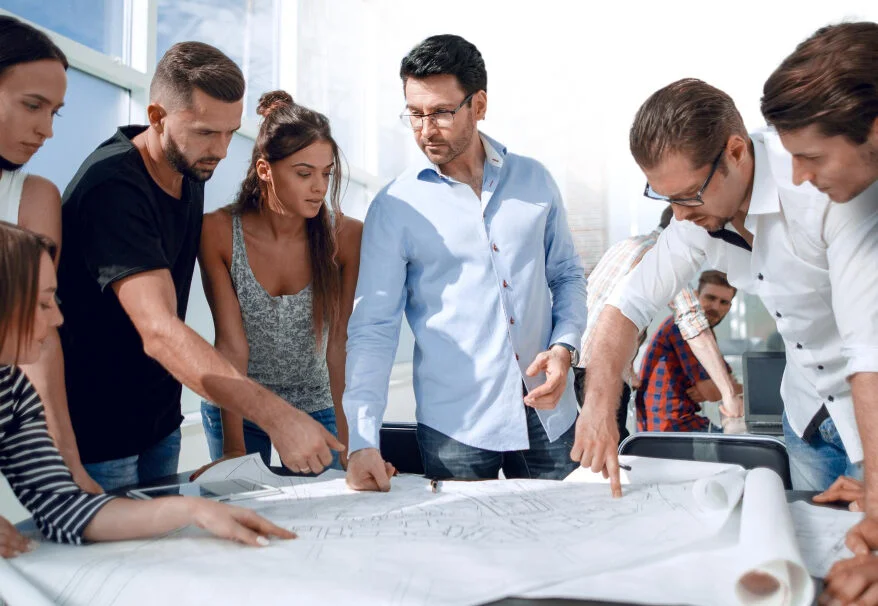 Home managing a project team e1713969025929